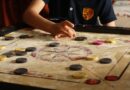 What are the major benefits of playing the game of Carrom?