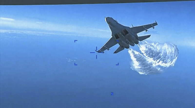 U.S. releases video of Russian jet dumping fuel on its drone